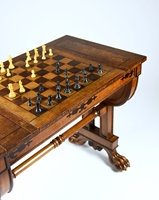 A Regency Period Games Table in Solid and Veneered Lacewood Inlaid with Ebony to a Design by George Smith