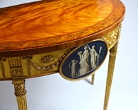 A George III Satinwood Marquetry Giltwood and Composition Demi-Lune Side Table 