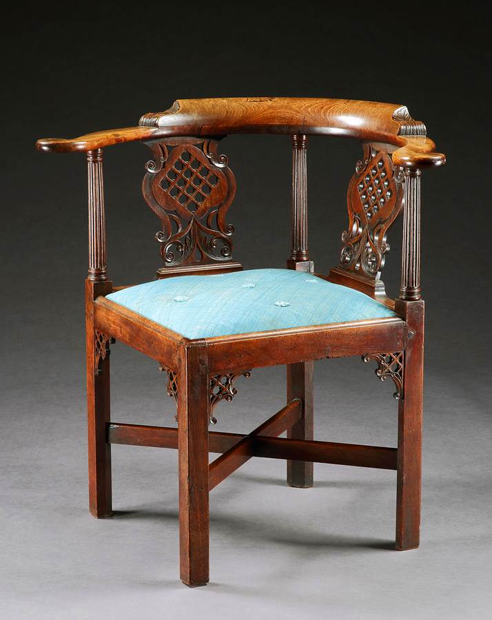 A George II Period Carved Mahogany Corner Chair
