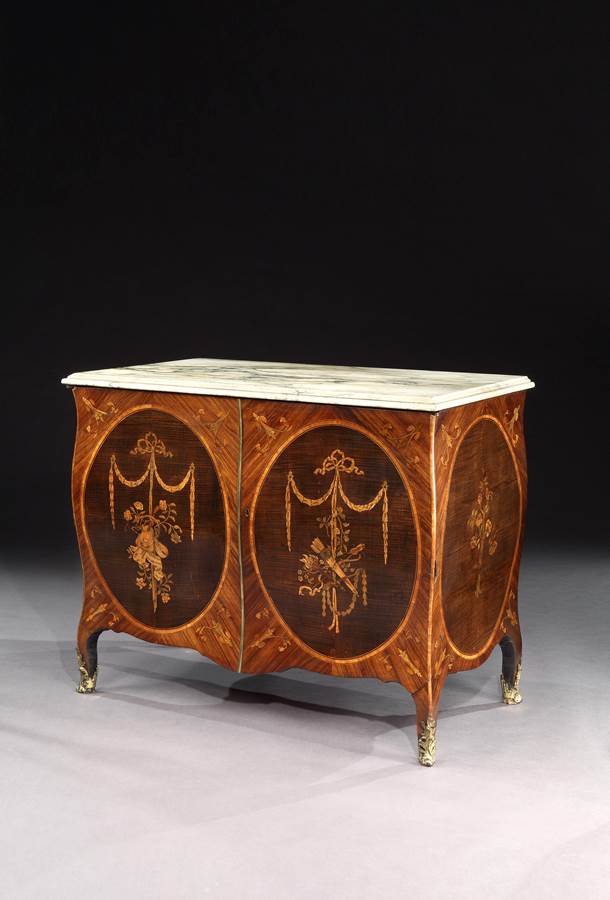 A Pair of George III Marquetry Bombe Commodes Attributed to Mayhew and Ince