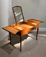 A George III Period Fiddleback Sycamore and Marquetry Dressing Table 

In the Manner of Mayhew and Ince

