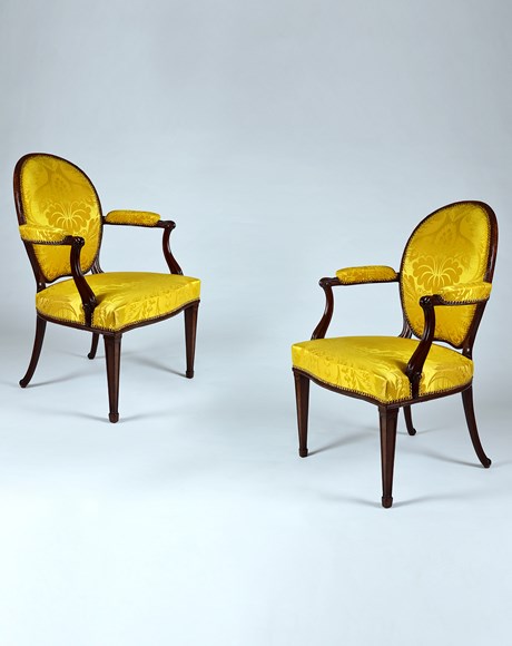 A Pair of George III Period Carved Mahogany Open Armchairs Attributed to Thomas Chippendale
