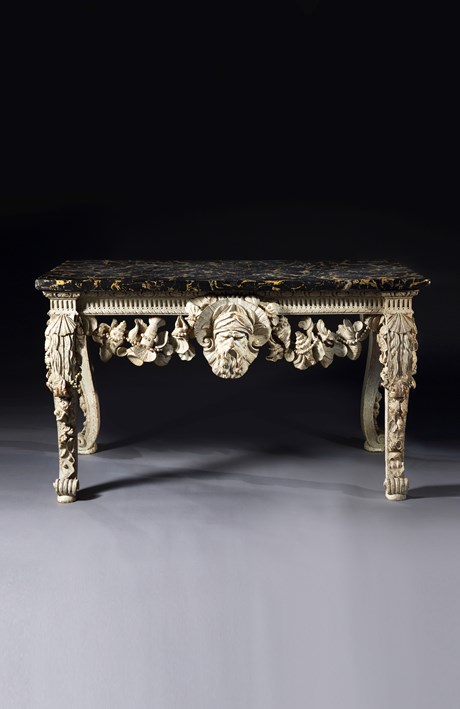 A RARE GEORGE II PERIOD CARVED AND PAINTED SIDE TABLE