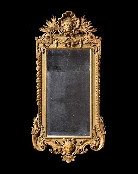 A rare George II giltwood architectural mirror