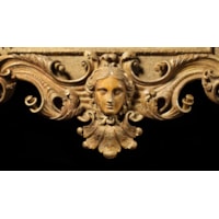 A rare George II giltwood architectural mirror