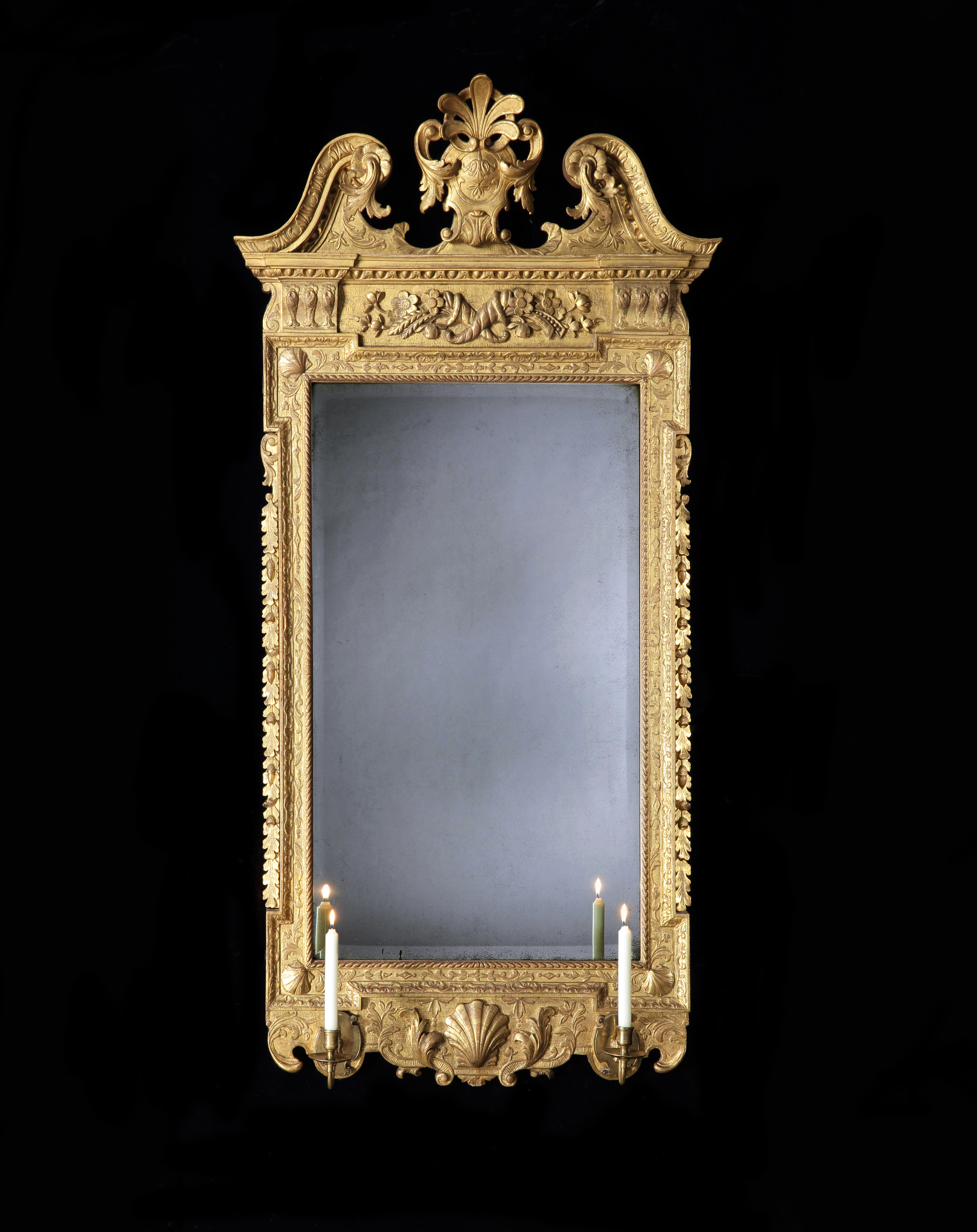 A George II Carved Giltwood Mirror