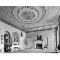 An important pair of carved and white painted hall benches from Kenwood House
