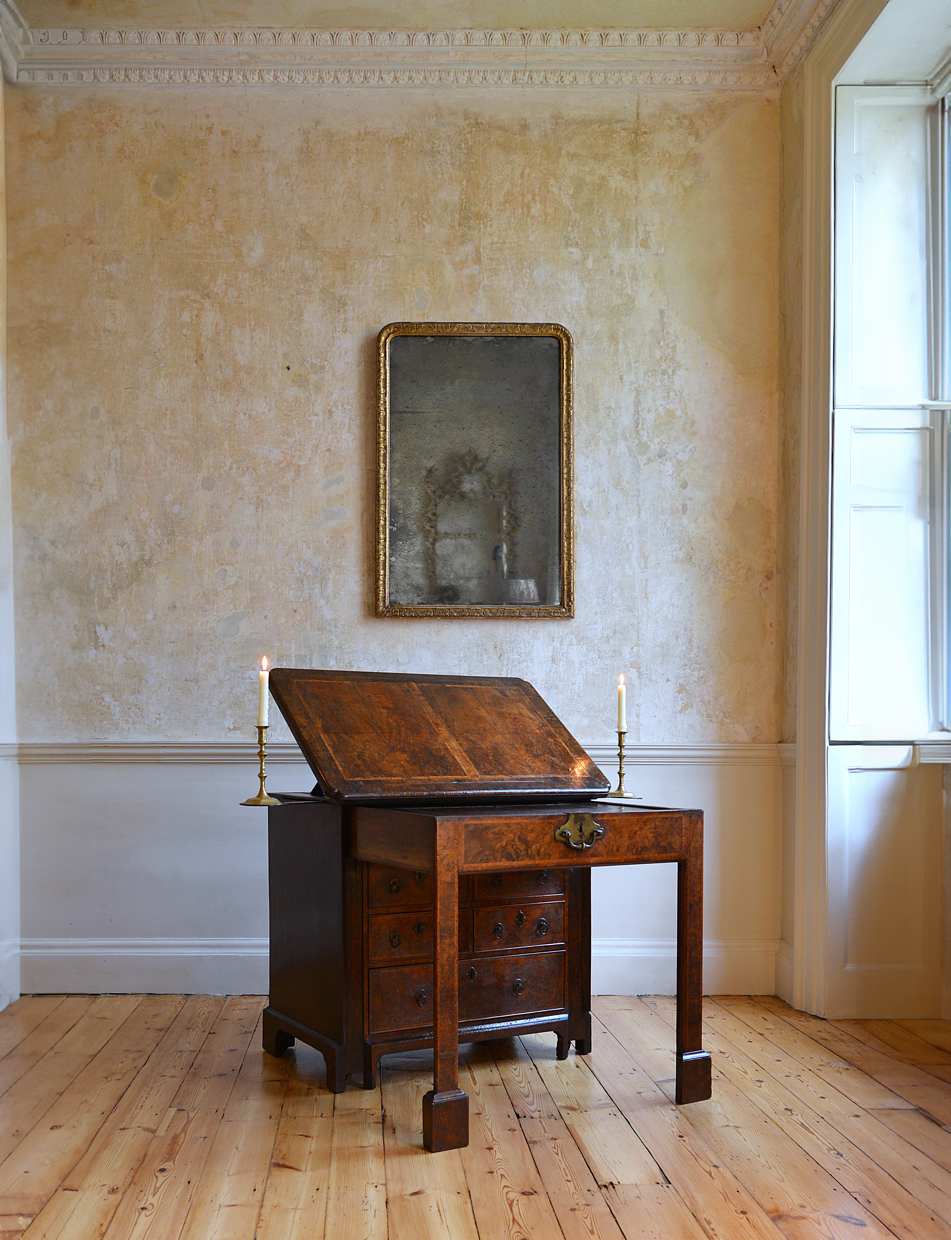 A GEORGE I PERIOD BURR WALNUT ARCHITECTS DESK