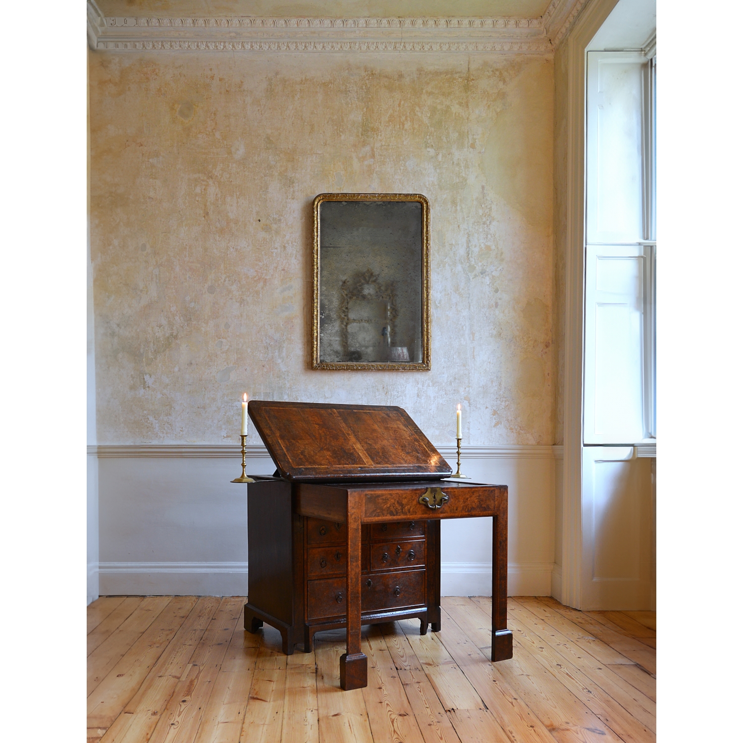 A GEORGE I PERIOD BURR WALNUT ARCHITECTS DESK