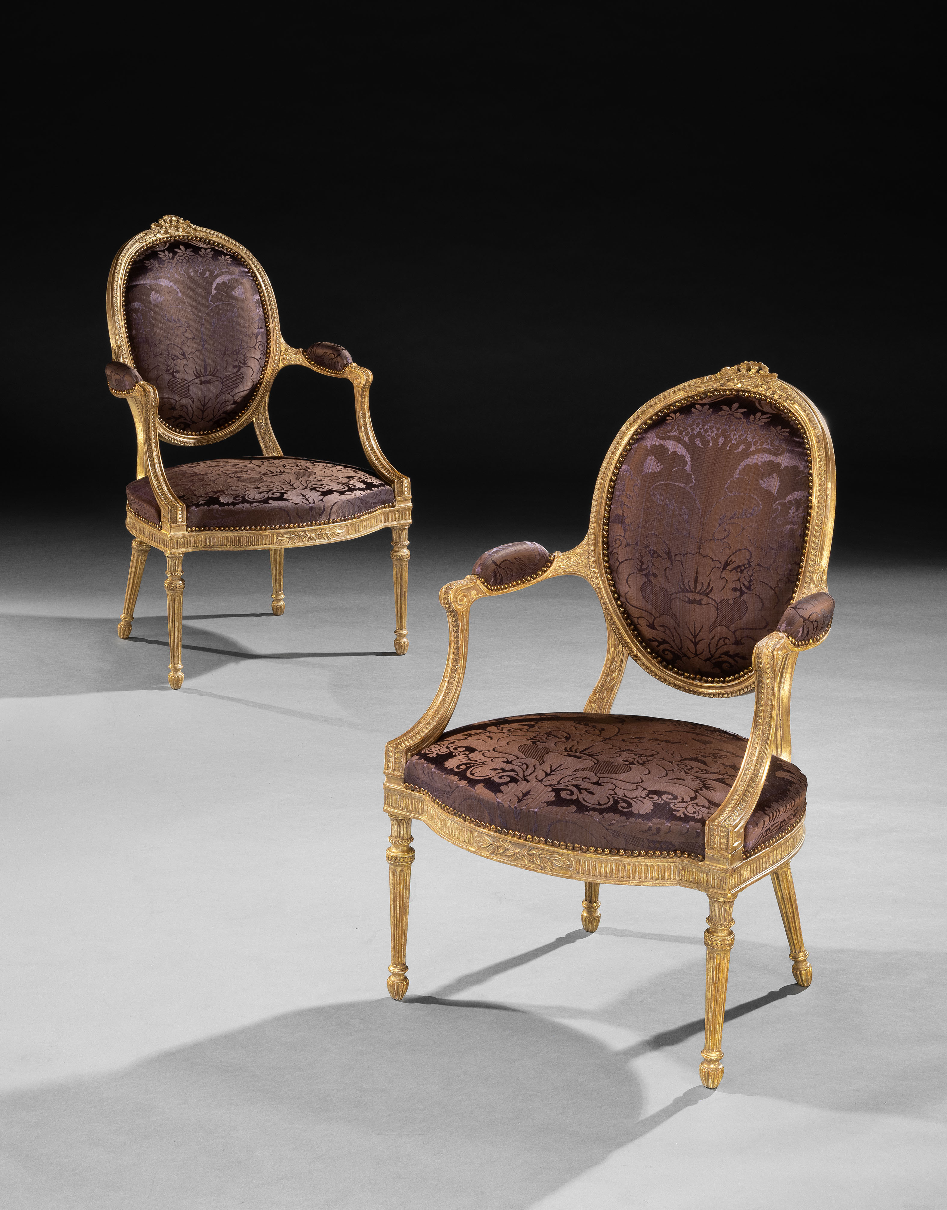 A PAIR OF GEORGE III PERIOD ARMCHAIRS