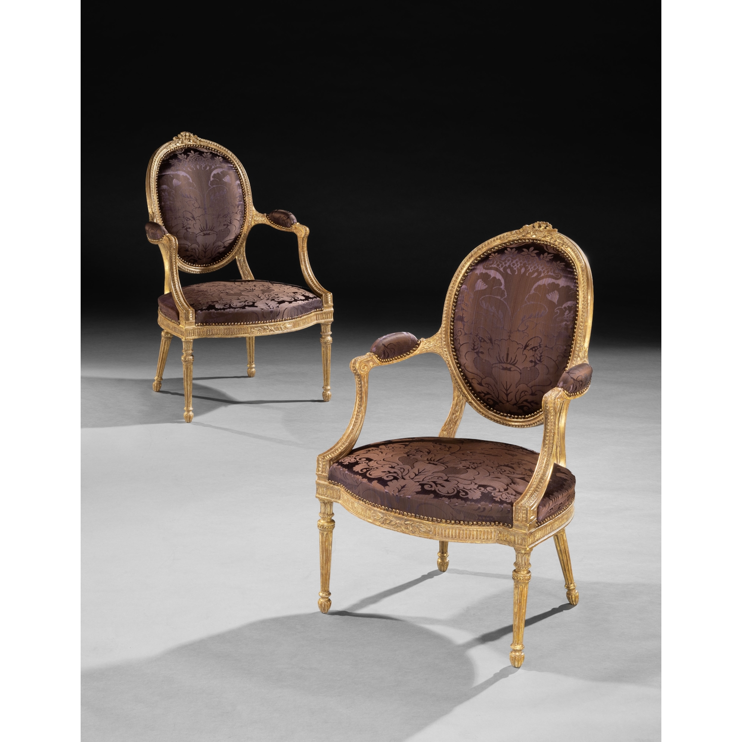 A PAIR OF GEORGE III PERIOD ARMCHAIRS