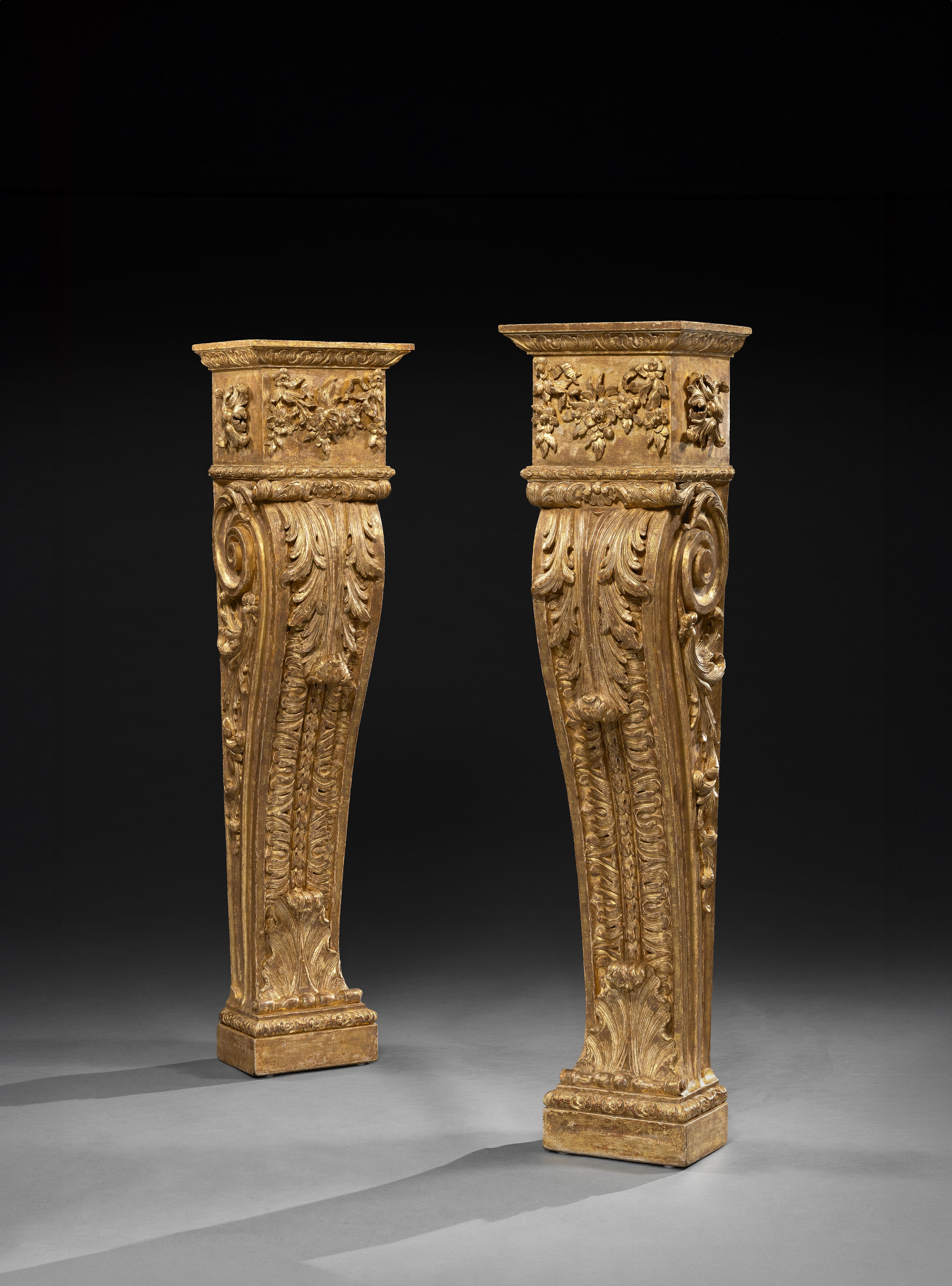 AN EXCEPTIONAL PAIR OF GEORGE II GILTWOOD PEDESTALS