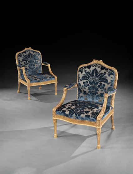 A Pair of George III Period Carved and Gilded Armchairs attributed to John Linnell
