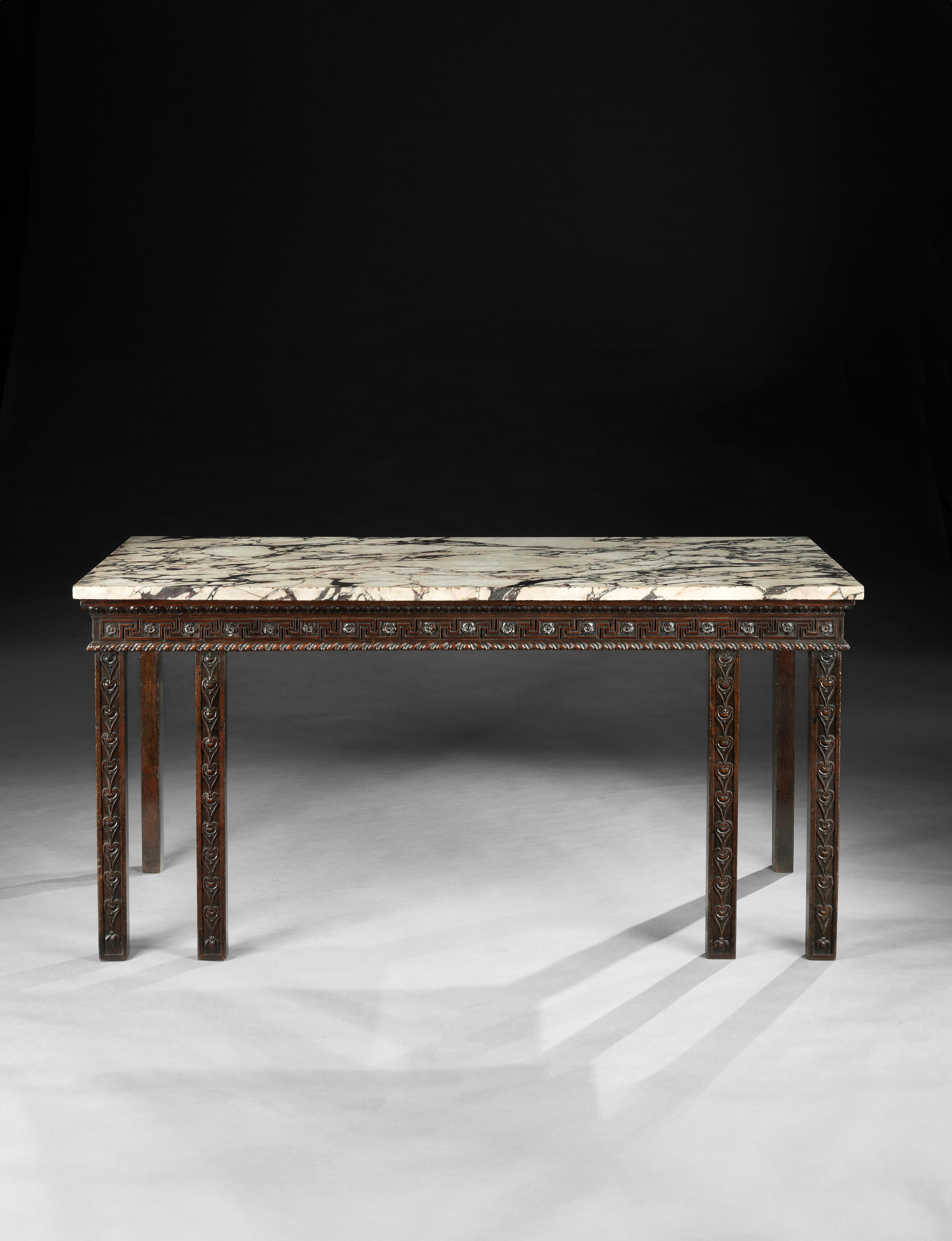 A GEORGE II PERIOD CARVED MAHOGANY SIDE TABLE  with Breccia Marble Top