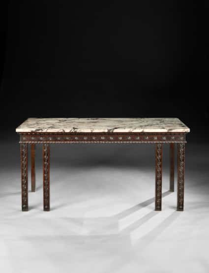 A GEORGE II PERIOD CARVED MAHOGANY SIDE TABLE  with Breccia Marble Top