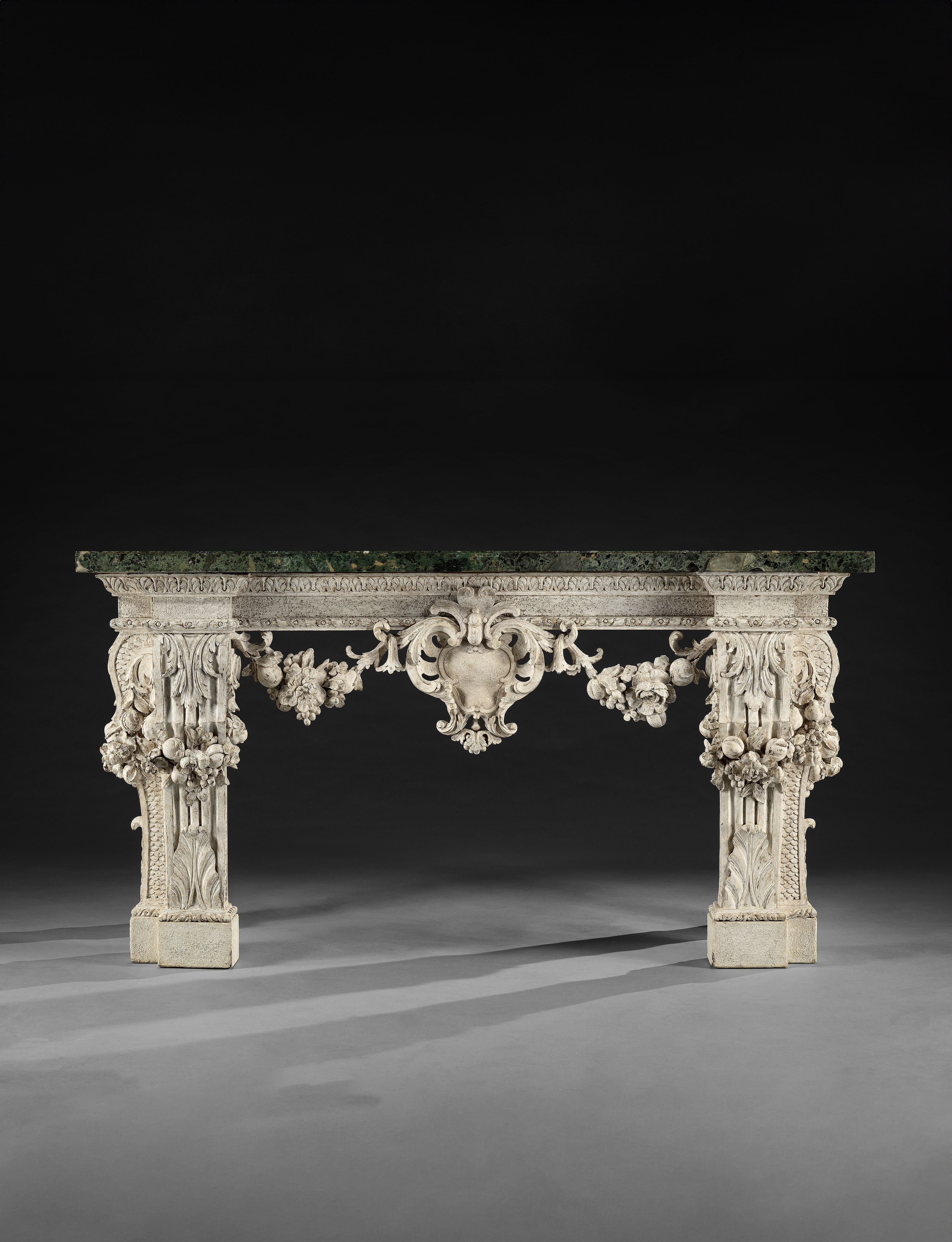AN IMPORTANT GEORGE II PERIOD CARVED SIDE TABLE