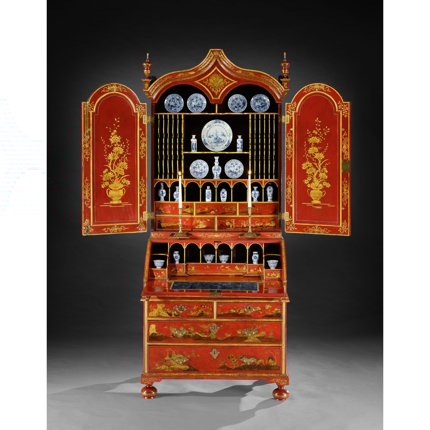 A GEORGE I PERIOD SCARLET AND GILT JAPANNED BUREAU CABINET