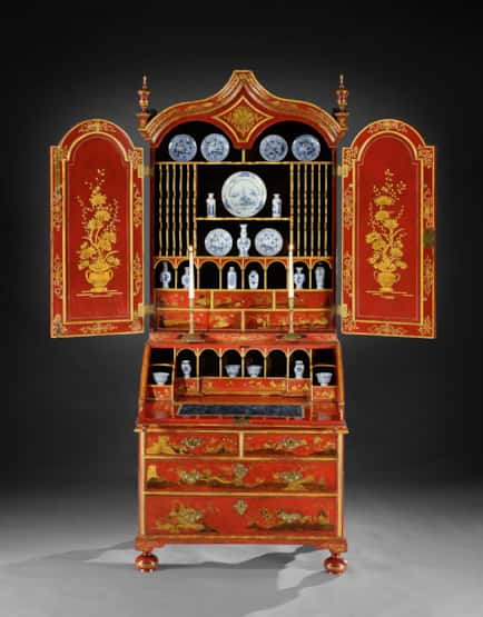 A GEORGE I PERIOD SCARLET AND GILT JAPANNED BUREAU CABINET