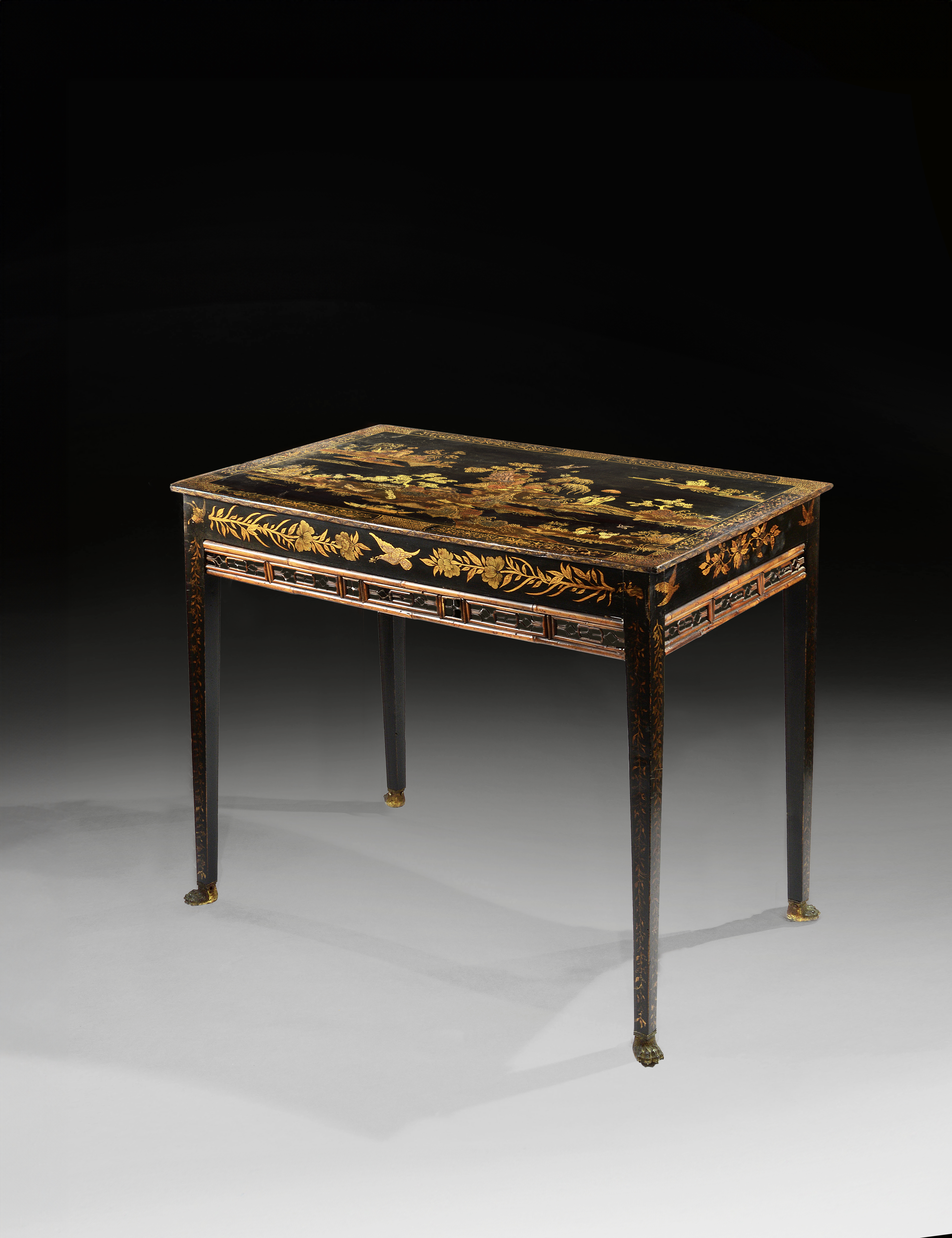 A Regency Period Japanned Centre Table with Bamboo Frieze