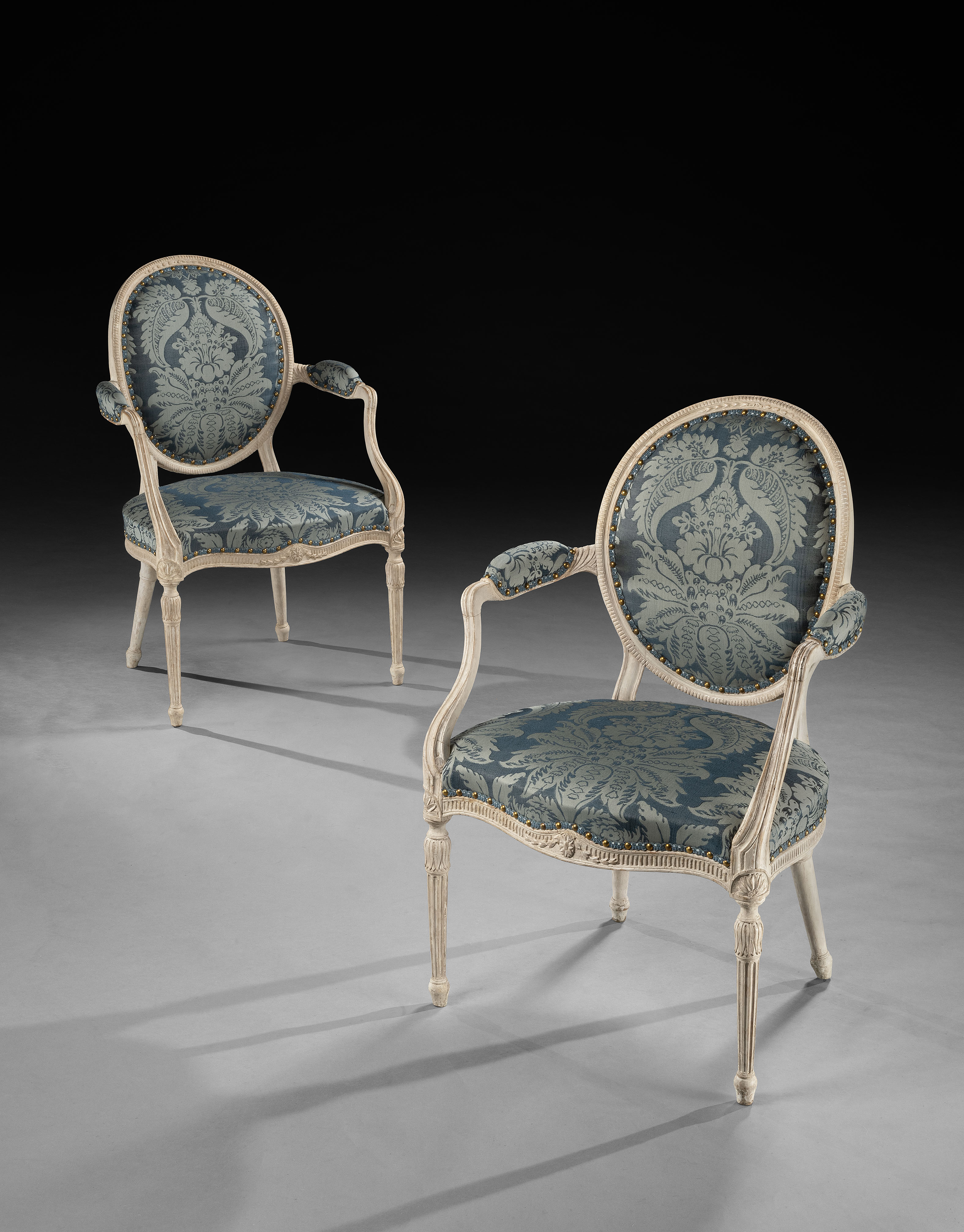 A Pair of George III period carved and painted Armchairs
