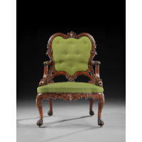 A RARE PAIR OF GEORGE II PERIOD CARVED MAHOGANY ARMCHAIRS AFTER A DESIGN BY THOMAS CHIPPENDALE