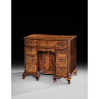 A George II Fiddleback Walnut Kneehole Desk