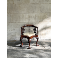 A GEORGE II CARVED MAHOGANY DESK CHAIR