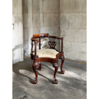 A GEORGE II CARVED MAHOGANY DESK CHAIR