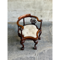 A GEORGE II CARVED MAHOGANY DESK CHAIR