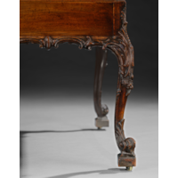 AN EXCEPTIONAL GEORGE III PERIOD CARVED MAHOGANY BUREAU ON STAND