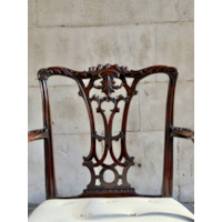 A GEORGE II CARVED MAHOGANY ARMCHAIR