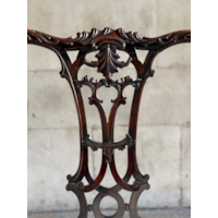 A GEORGE II CARVED MAHOGANY ARMCHAIR