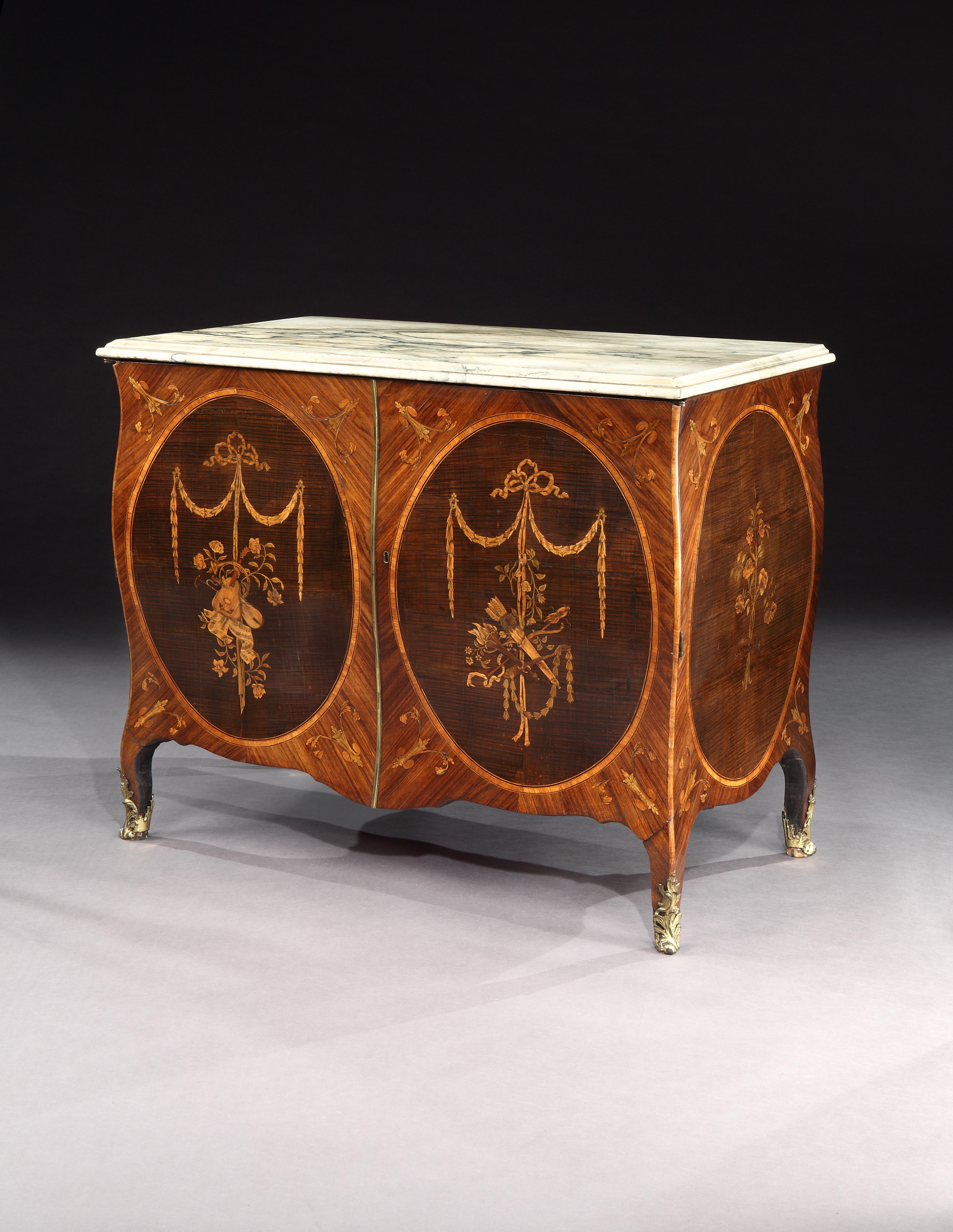 A Pair of George III Marquetry Bombe Commodes Attributed to Mayhew and Ince