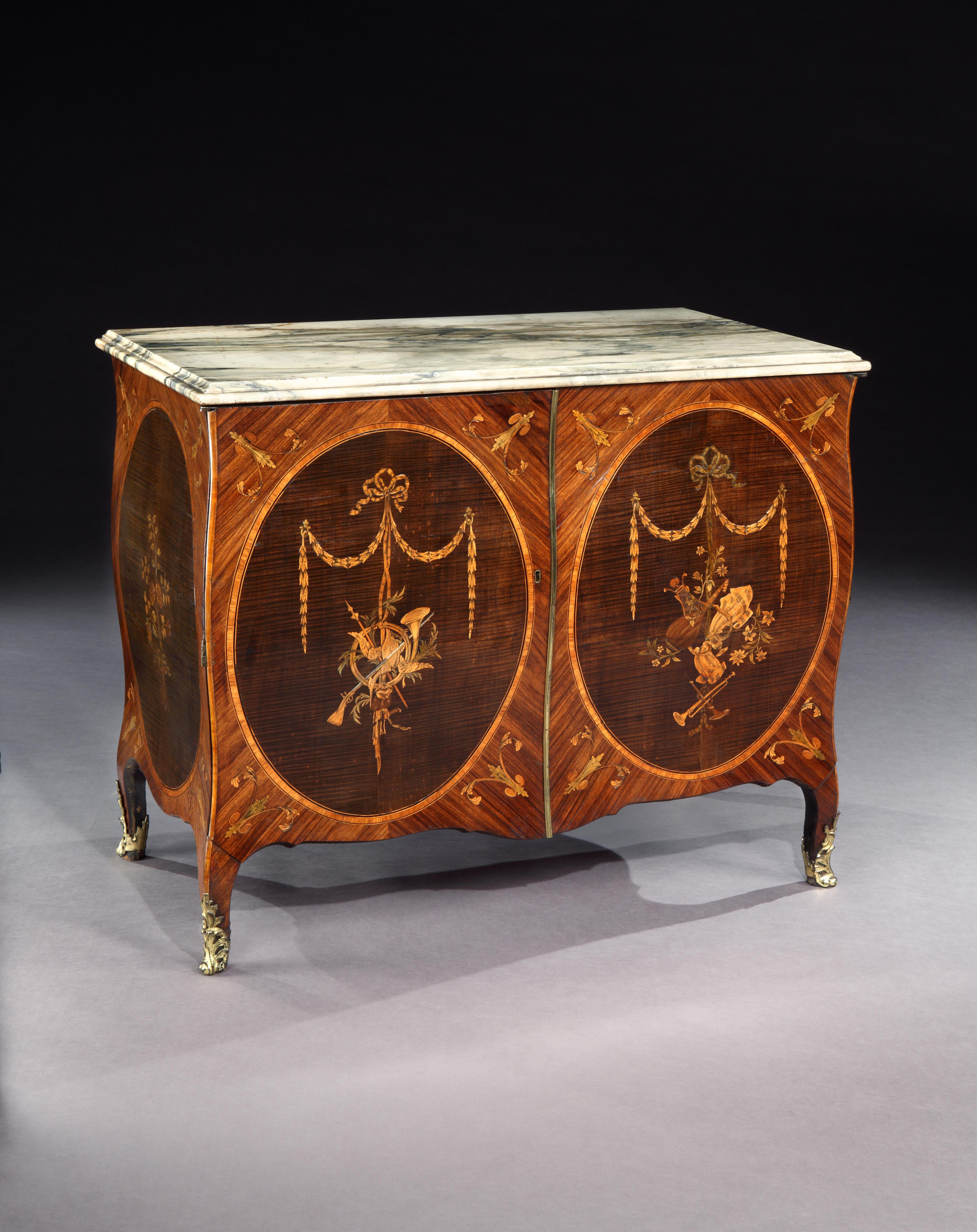 A Pair of George III Marquetry Bombe Commodes Attributed to Mayhew and Ince