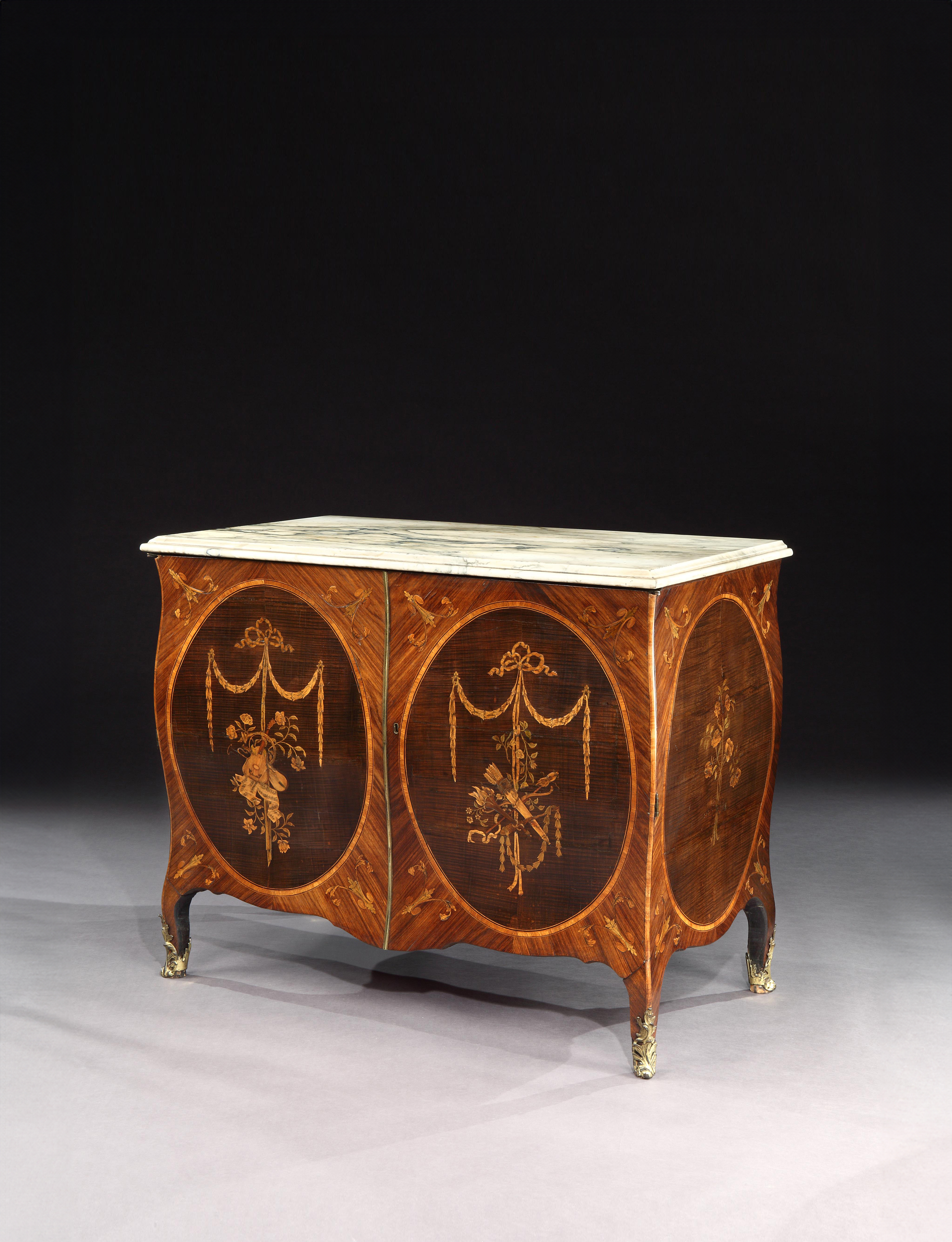 A Pair of George III Marquetry Bombe Commodes Attributed to Mayhew and Ince