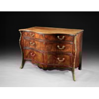 A George III period mahogany serpentine commode Attributed to Henry Hill of Marlborough
