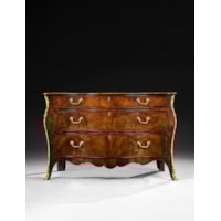 A George III period mahogany serpentine commode Attributed to Henry Hill of Marlborough
