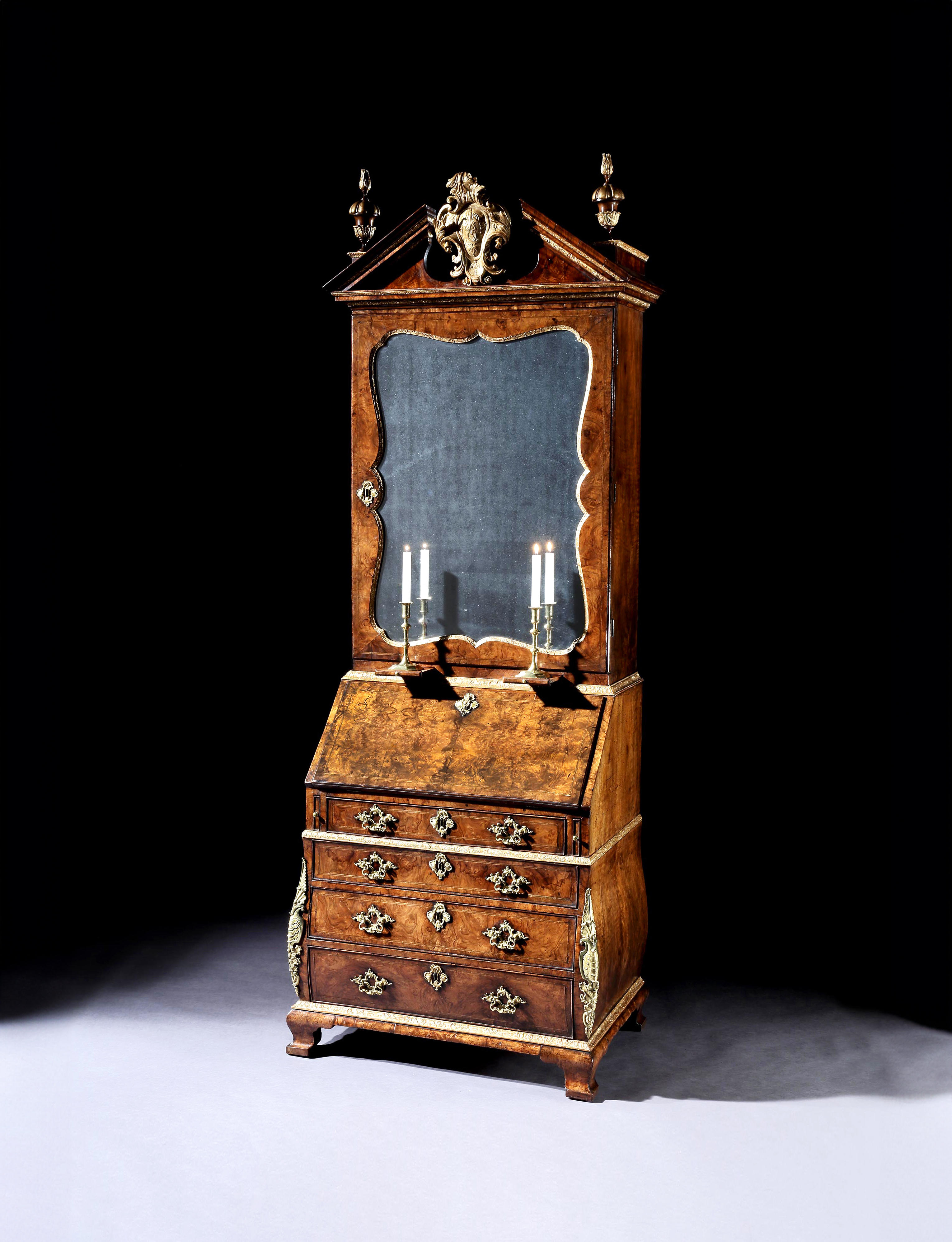 A George II Burr Walnut Parcel-Gilt and Gilt Bronze Mounted Bureau Bookcase In the manner of Giles Grendey
