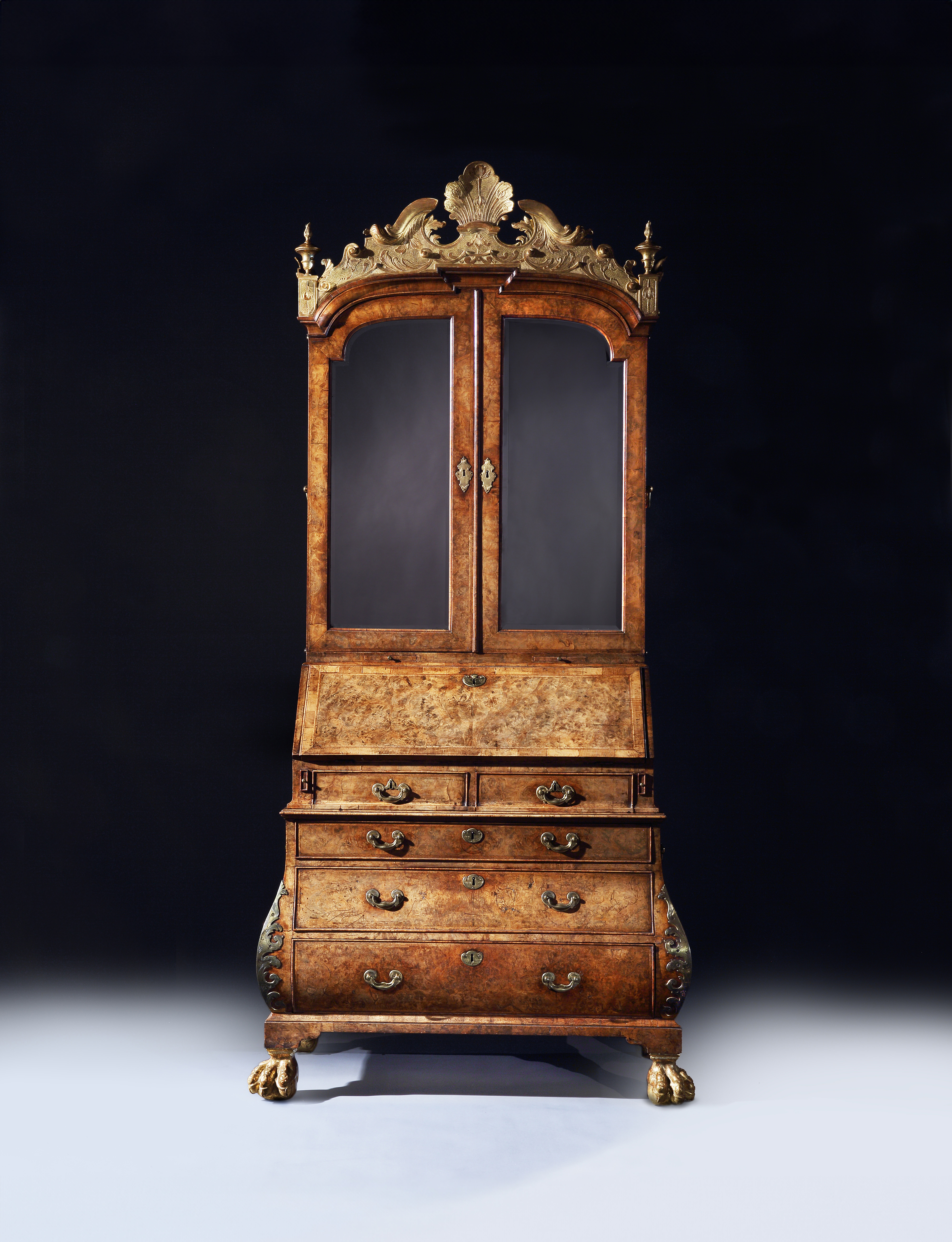 A George I Period Burr Walnut Giltwood and Brass Mounted Bombe Bureau Cabinet