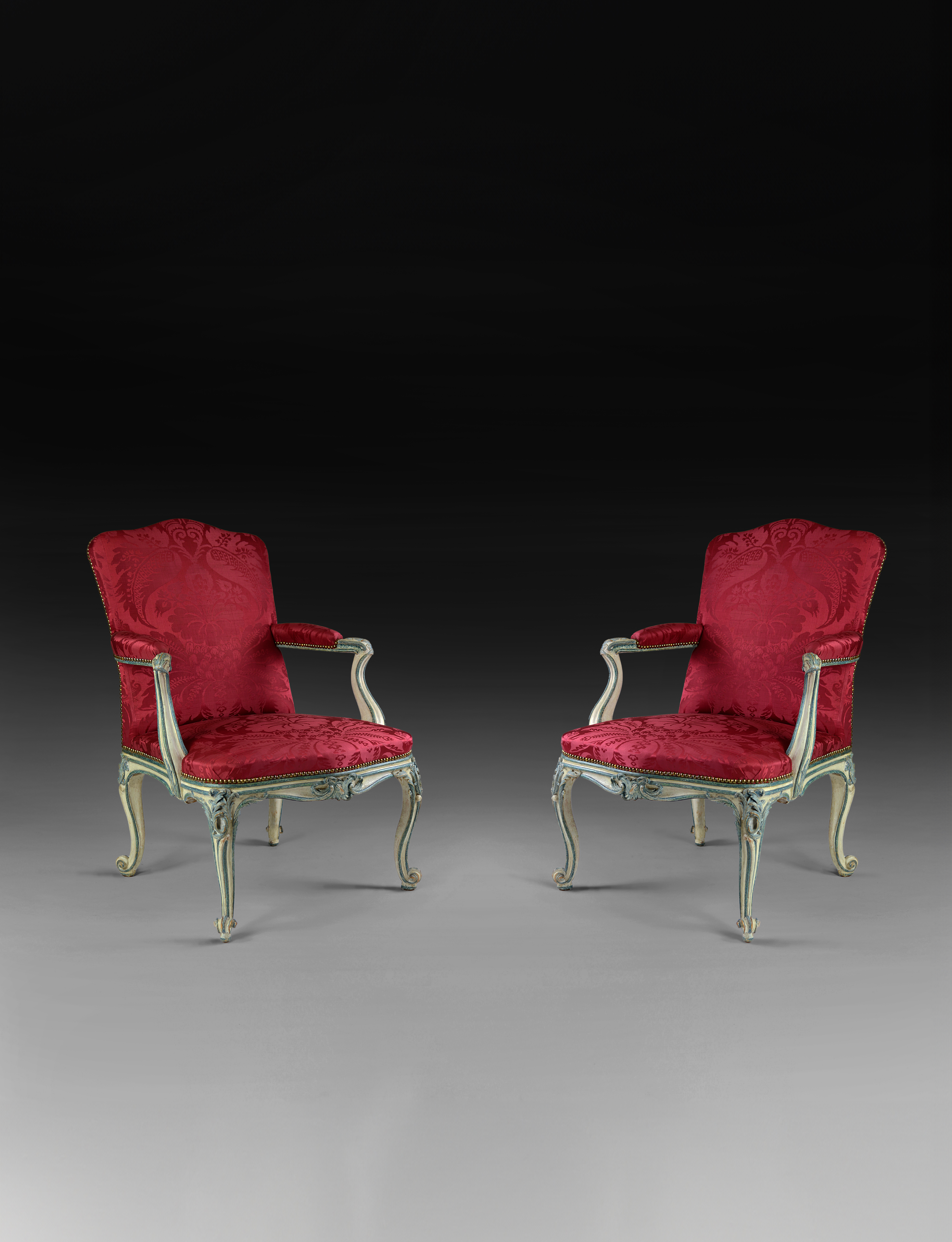 A PAIR OF GEORGE III BLUE AND WHITE PAINTED ARMCHAIRS  From Easton Neston House Attributed to John Cobb