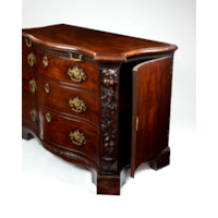 A PAIR OF GEORGE II PERIOD SERPENTINE FRONTED MAHOGANY COMMODES ATTRIBUTED TO THE WORKSHOP OF WILLIAM VILE OR WILLIAM HALLETT THE CARVING POSSIBLY BY JOHN BOSON