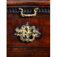 A PAIR OF GEORGE II PERIOD SERPENTINE FRONTED MAHOGANY COMMODES ATTRIBUTED TO THE WORKSHOP OF WILLIAM VILE OR WILLIAM HALLETT THE CARVING POSSIBLY BY JOHN BOSON